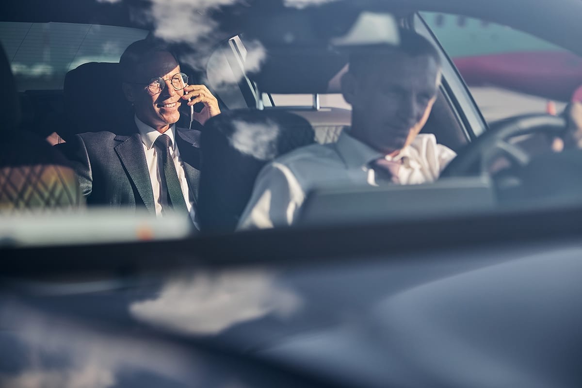 Luxury airport transfer with professional chauffeur for business travelers on the French Riviera
