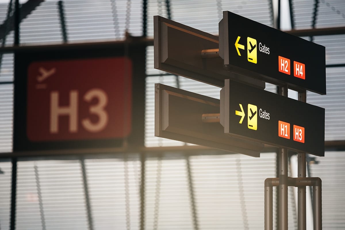 Airport departure gate signs H1–H4, illustrating smooth terminal navigation