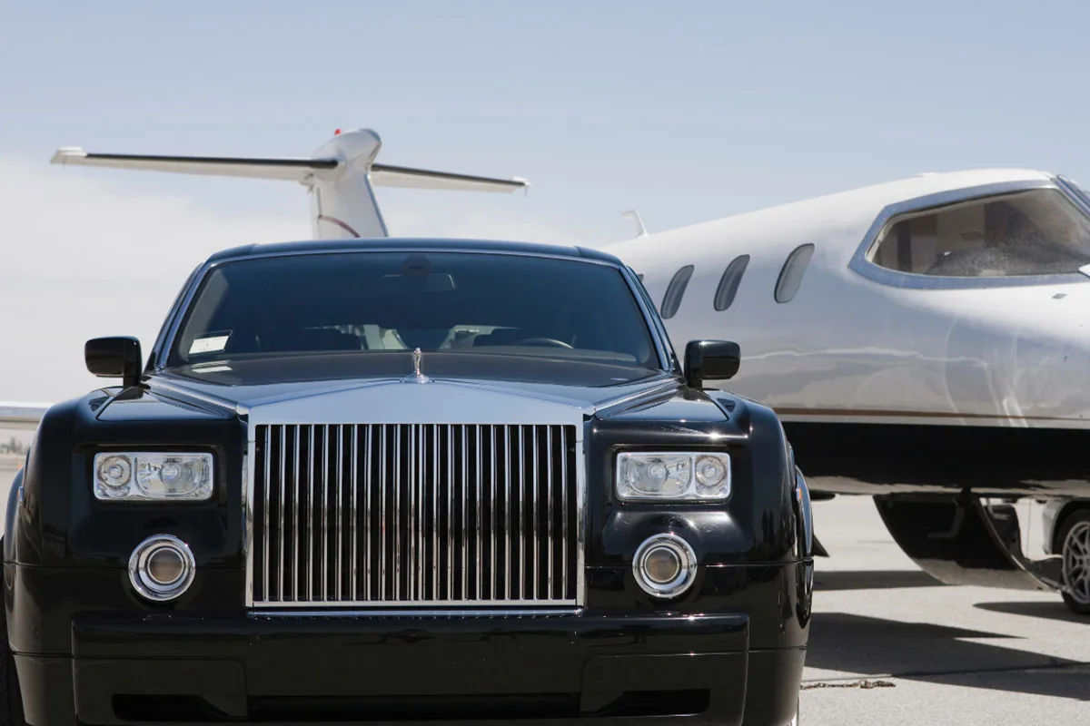 private-driver-service-french-riviera-high-end-transport Luxury private driver service in the French Riviera with premium car pickup at a private jet terminal.